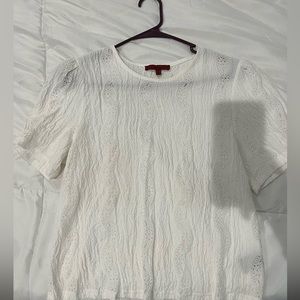 Stretchy, short, fun blouse. Lacy material.